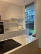Luxuriöse 1-Zimmer-Wohnung mit Freifläche & Garagenstellplatz - Bild
