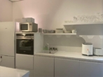 Luxuriöse 1-Zimmer-Wohnung mit Freifläche & Garagenstellplatz - Bild